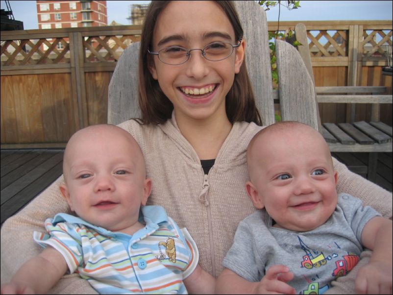 Carly holding Sebastian & Owen